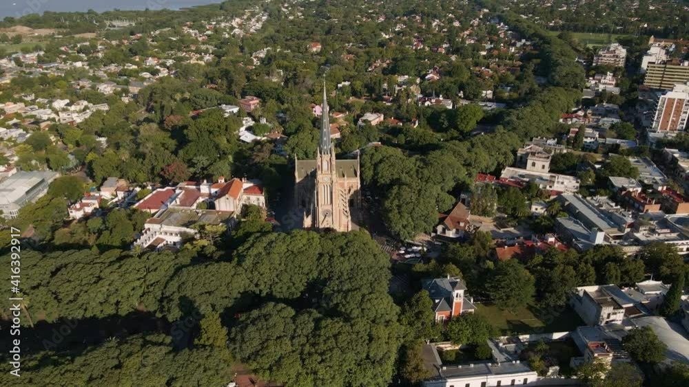 Aerial of San Isidro Cathedral and revealing La Plata river and Buenos Aires city on background Aerial of San Isidro Cathedral and revealing La Plata river and Buenos Aires city on background