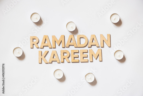 Foto Ramadan. Wooden letters on white background.