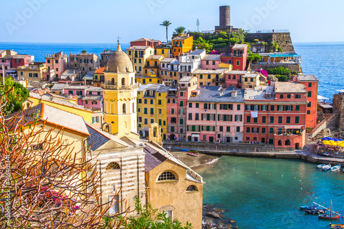 Colorful villages in Cinque terre, Italy and seascape at sunset