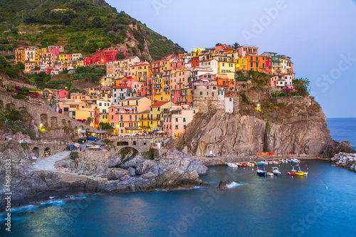 Colorful villages in Cinque terre, Italy and seascape at sunset