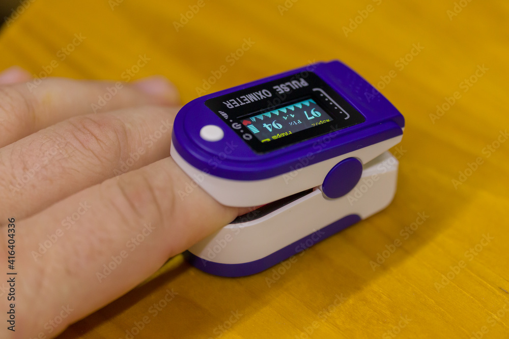 a pulse oximeter on the finger measures the oxygen level in the patient's body a pulse oximeter on the finger measures the oxygen level in the patient's body