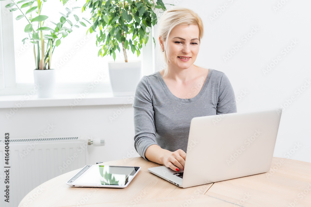 Happy Young Beautiful Woman Using Laptop, Indoors. Happy Young Beautiful Woman Using Laptop, Indoors.