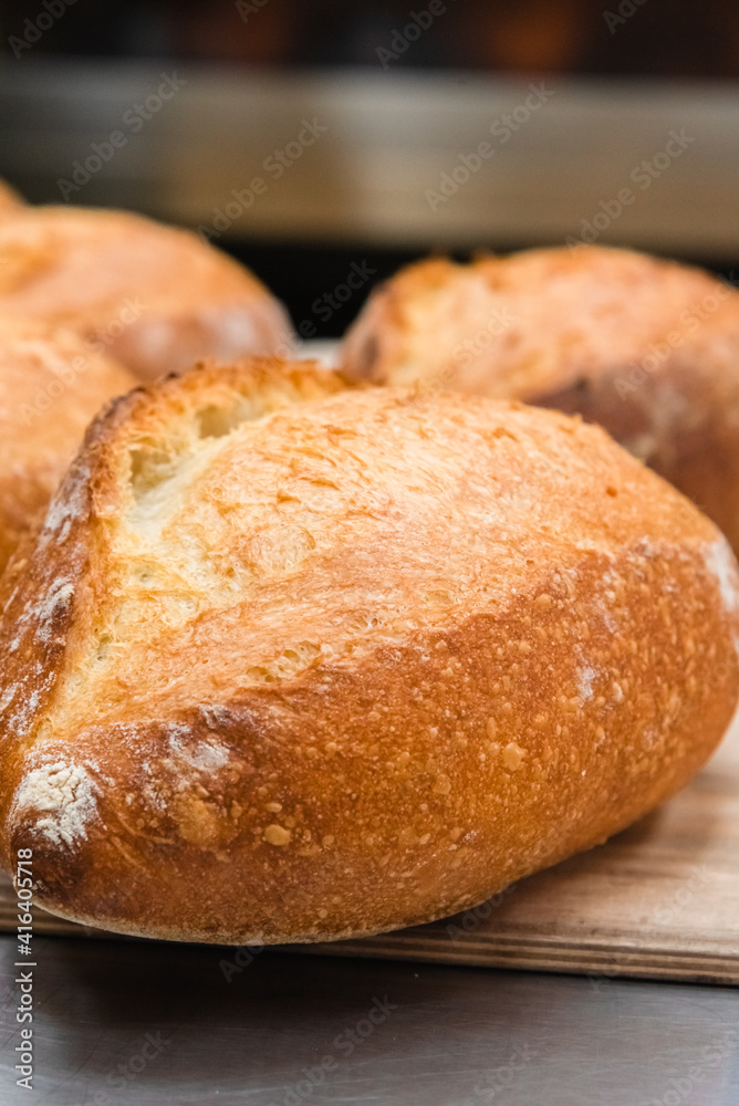 Craft bread on the table at the bakery. The concept of small industries and healthy food