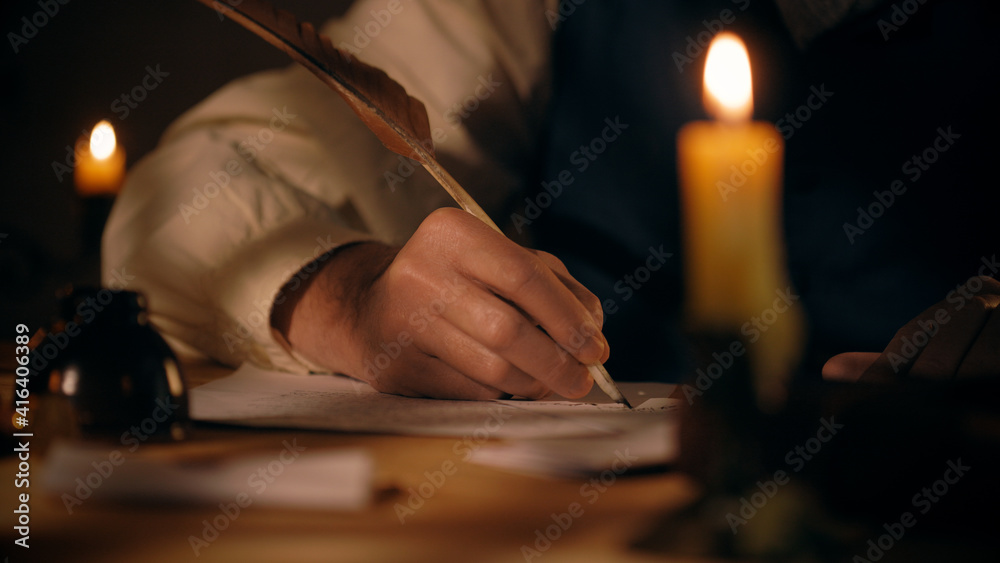A scene typical of 18th century with main focus on man writing with quill pen in background. A scene typical of 18th century with main focus on man writing with quill pen in background.