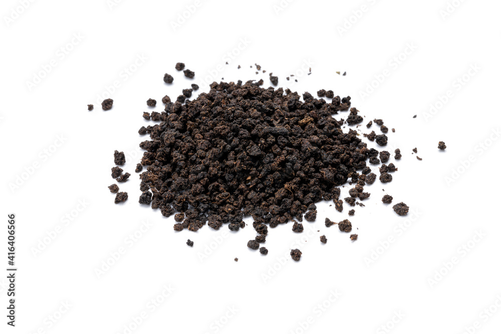black tea granules isolated on white background. design element. indian beverage tea cut out