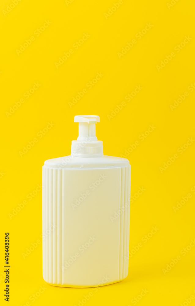 blank packaging white cosmetic cream or soap pumping bottle isolated on yellow blank packaging white cosmetic cream or soap pumping bottle isolated on yellow