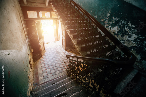 Old vintage staircase at the old abandoned building