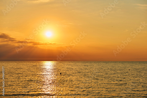 Amazing Sunset on the Sea. Adriatic sea  beautiful sunset  waves and landscape.  Lignano Sabbiadoro  Italy.