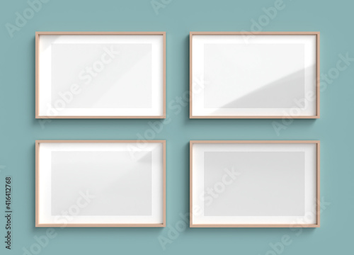 3D Render mockup of four horizontal wooden empty frame with white paper border inside and gray space on bright green wall. Border template creative project concept with sunlight