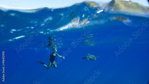 Swimming With a Green Sea Turtle in Hawaii 