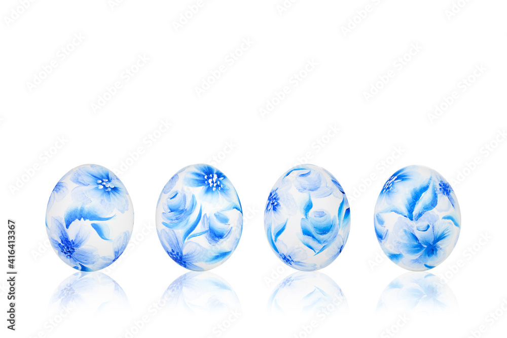 Easter eggs with blue floral pattern on white isolated background. Easter eggs with blue floral pattern on white isolated background.