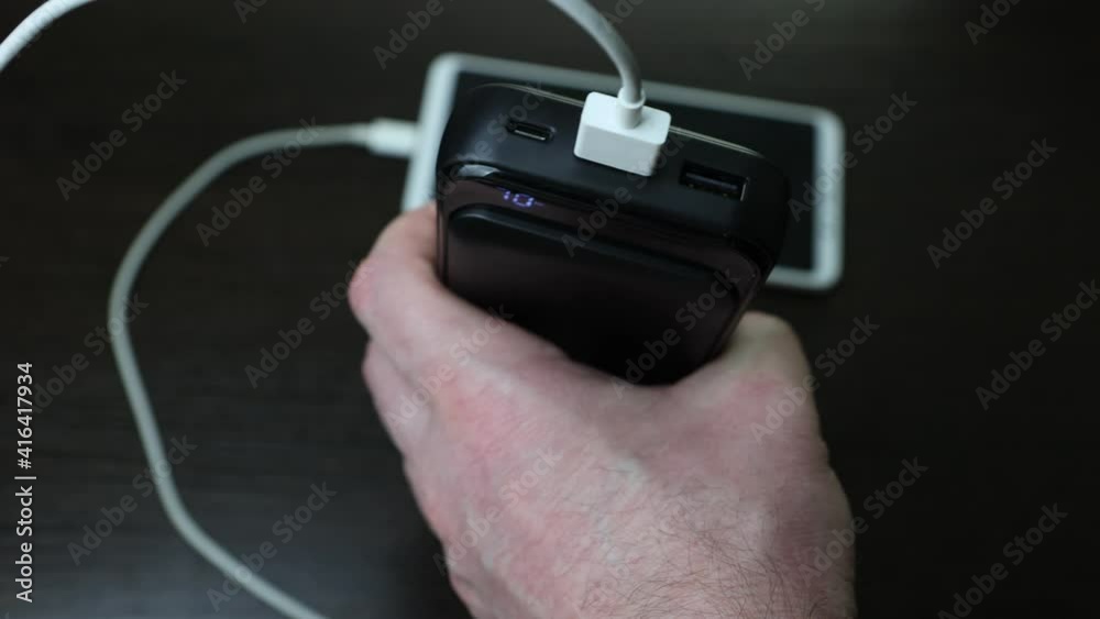 Charging a mobile phone from an external battery. Charging a mobile phone from an external battery.