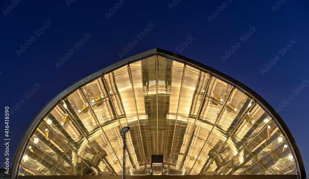 Modern train station glas roof at blue hour