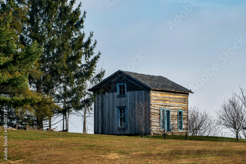 log cabin at sunrise