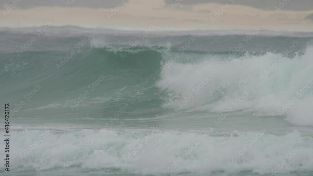 Wave collapsing on itself on a gloomy day. Wave collapsing on itself on a gloomy day.