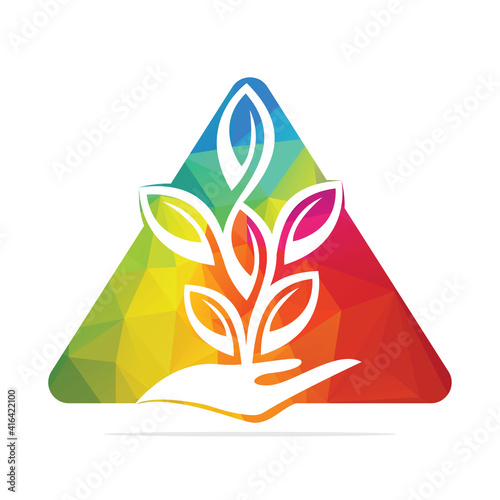 Plant in Hand Vector Logo Design. Natural Products in Triangle Shape. Cosmetics and Spa logo.	
