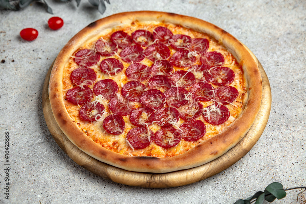 Tasty hot italian pizza with pepperoni and cheese. Pizzeria menu. Concept poster for Restaurants or pizzerias. Tasty hot italian pizza with pepperoni and cheese. Pizzeria menu. Concept poster for Restaurants or pizzerias.