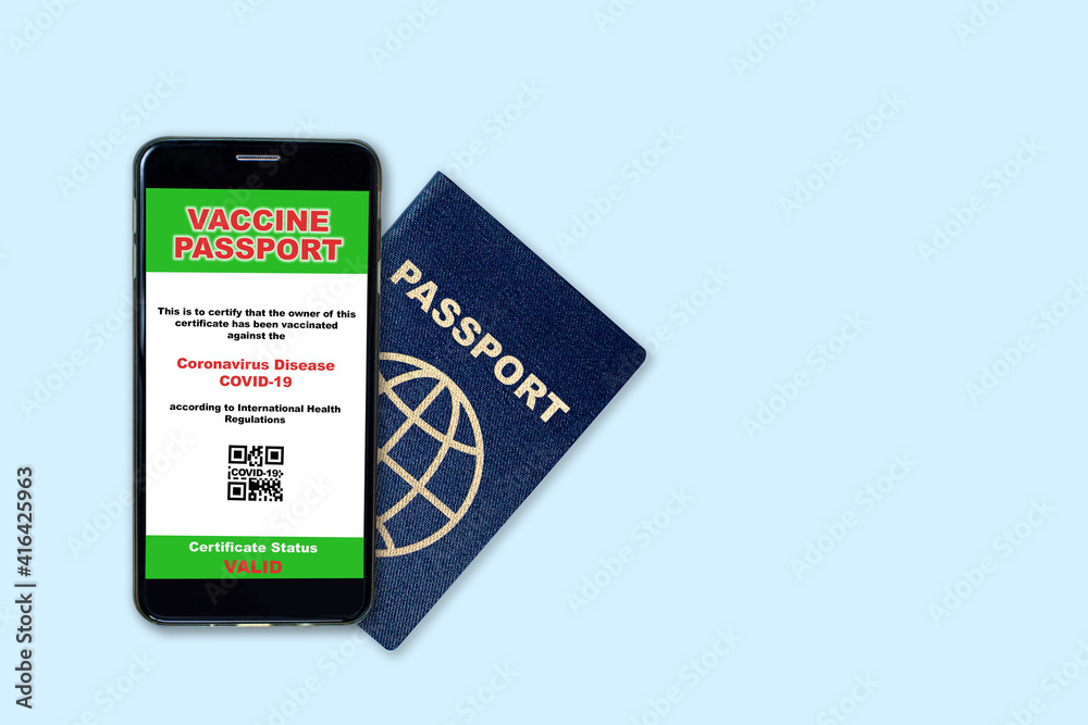 Vaccine passport concept showing proof of COVID-19 vaccination on smartphone and travel passport. New normal for air and land border travel. Vaccine passport concept showing proof of COVID-19 vaccination on smartphone and travel passport. New normal for air and land border travel.