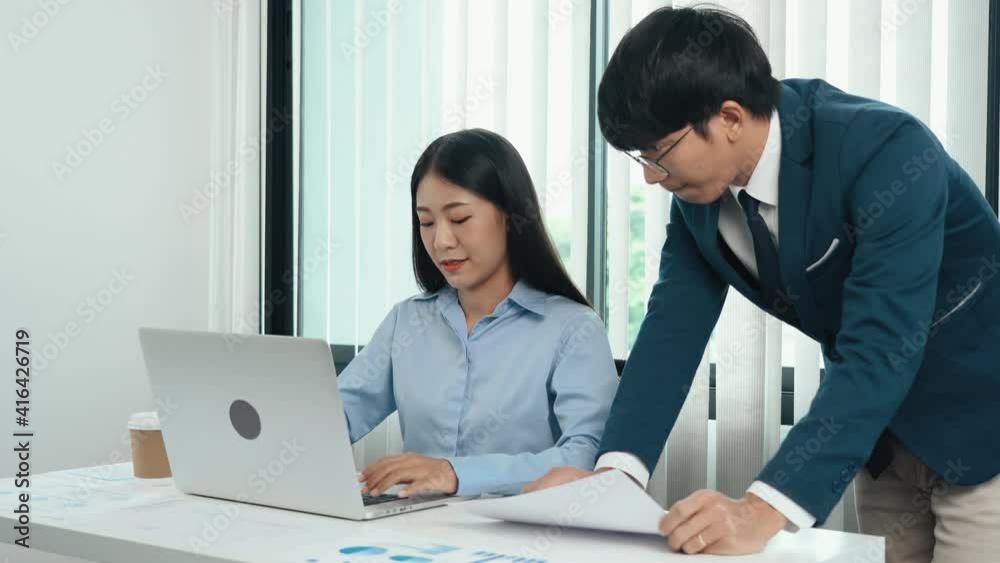 Employees are presenting the company's key performance in terms of financial information to the office manager. Employees are presenting the company's key performance in terms of financial information to the office manager.