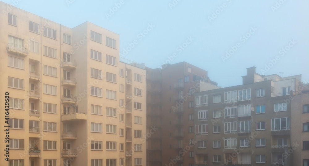 Apartment buildings in fog and mist, Oostende (Ostend), Belgium.