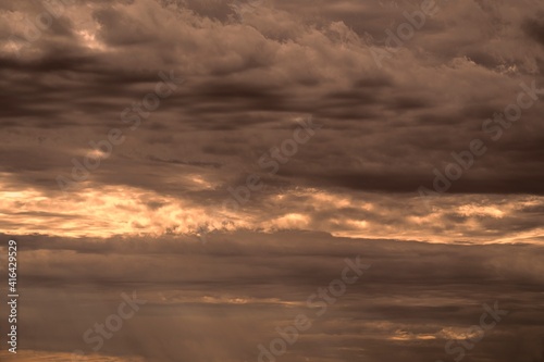 This image shows a cloudy sky at sunset.