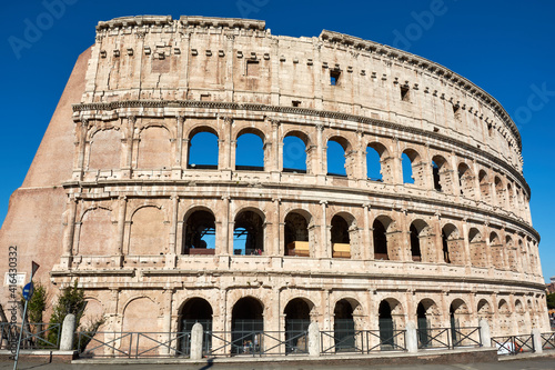 An exterior view of the Roman Colosseum or Flavian Amphitheatre, an ancient structure which is the biggest amphitheatre built by the Roman Empire. One of the seven wonders of the world.