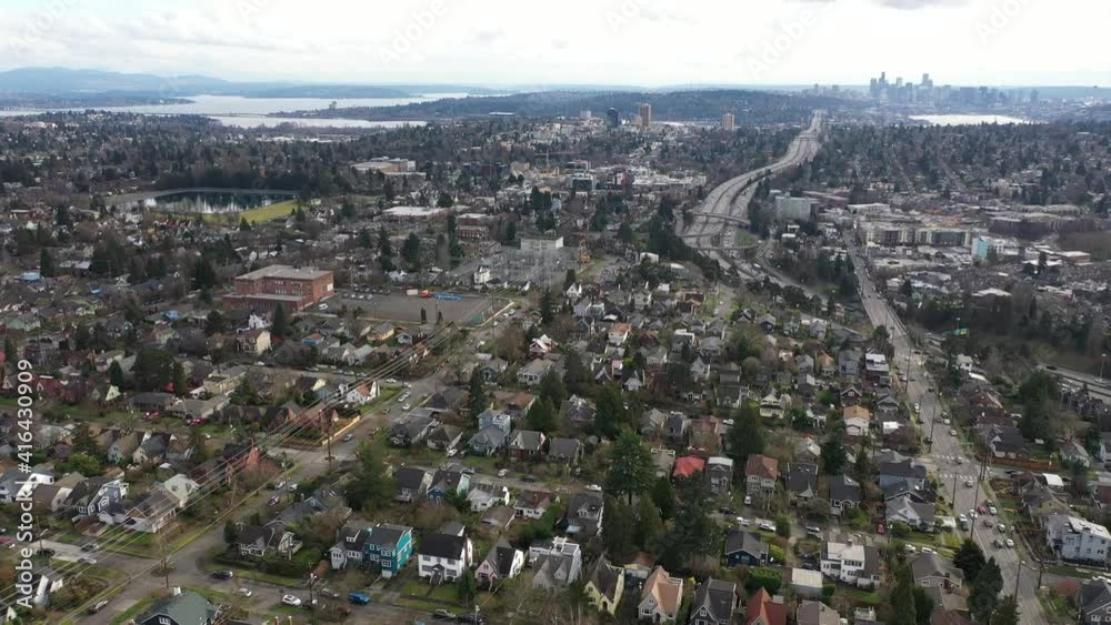 Cinematic aerial drone shot of Maple Leaf, Roosevelt, Ravenna, Green Lake, Meridian, University District, I-5 freeway with Lake Union, Lake Washington and downtown Seattle in the distance Cinematic aerial drone shot of Maple Leaf, Roosevelt, Ravenna, Green Lake, Meridian, University District, I-5 freeway with Lake Union, Lake Washington and downtown Seattle in the distance