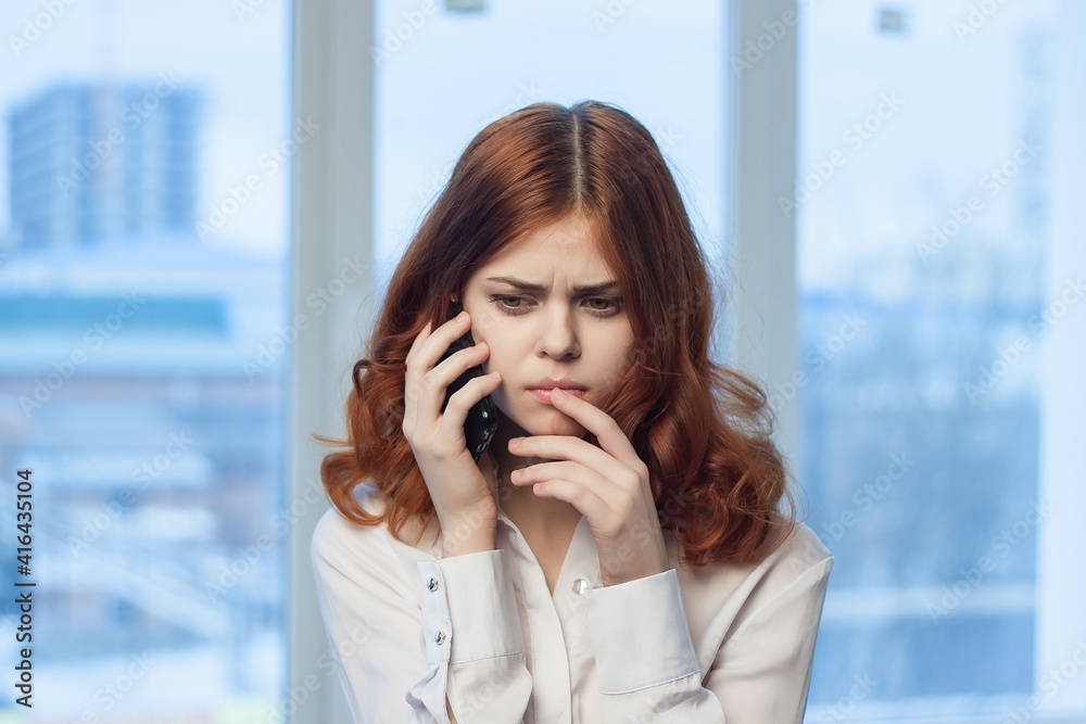 woman manager in office talking on the phone technology woman manager in office talking on the phone technology