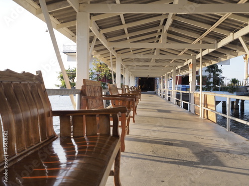The morning sun rises where tourists are popular to come to visit the sea temple and see the local fishermen lifestyle next to the sea