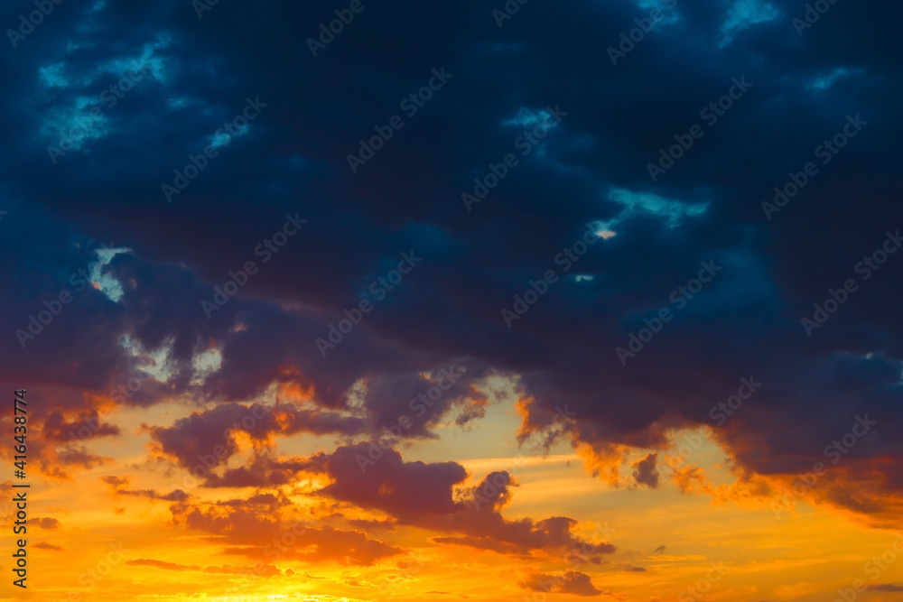 Beautiful heaven landscape, blue and orange clouds, amazing view on sunset, beauty of wonderful nature