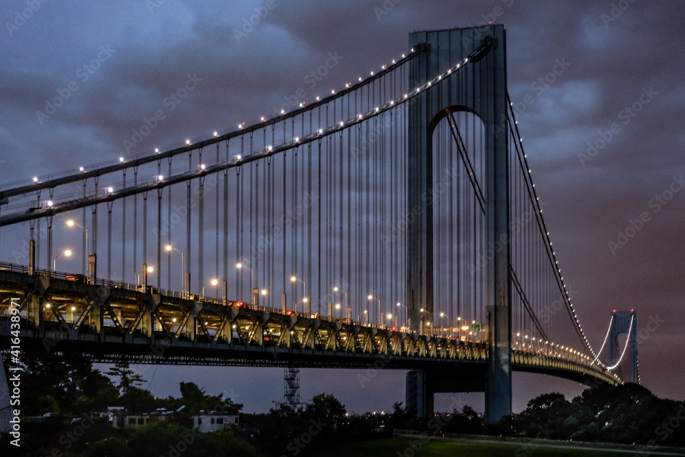 Fototapeta premium Night Falls On Suspension Bridge