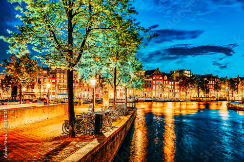 Photography Famous Amstel river and night view of beautiful Amsterdam city