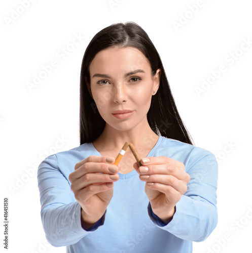 Young woman with broken cig...