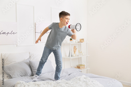 Screaming little boy with m...