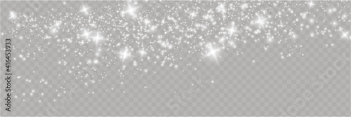 Sparkling magical dust particles . The dust sparks and golden stars shine with special light.