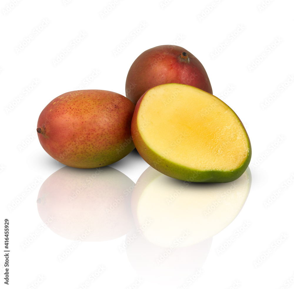 mango slice cut in half mirror shadows reflections isolated on white background with clipping path mango slice cut in half mirror shadows reflections isolated on white background with clipping path