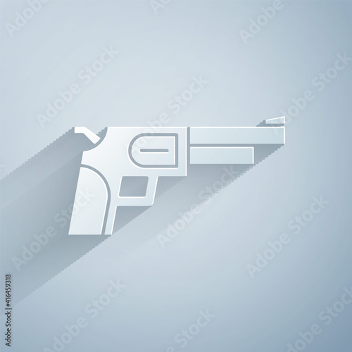 Paper cut Revolver gun icon isolated on grey background. Paper art style. Vector.
