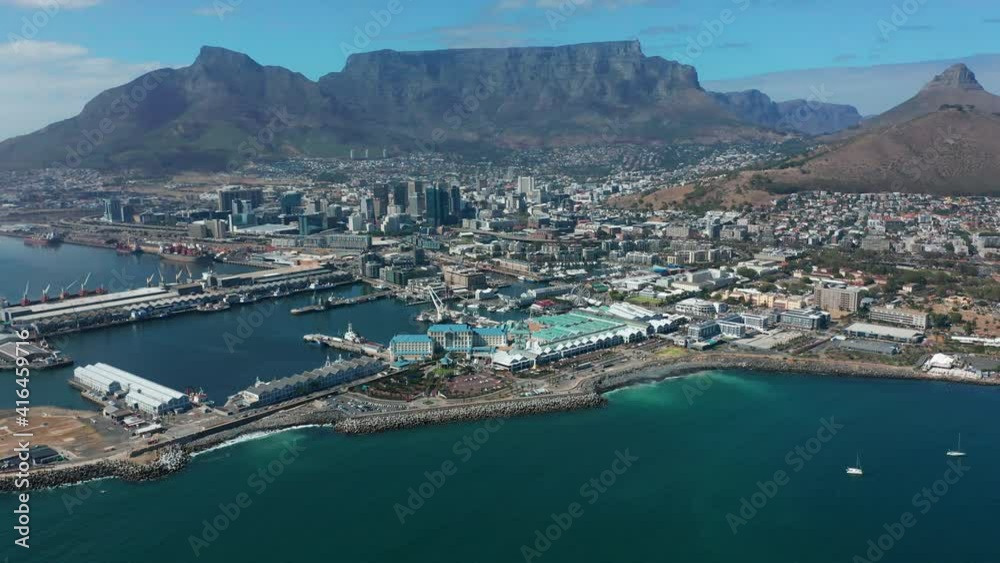 Aerial view flying towards the city of Cape Town with Table Mountain. Aerial view flying towards the city of Cape Town with Table Mountain.