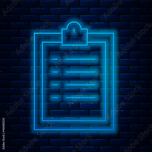 Glowing neon line Clipboard with checklist icon isolated on brick wall background. Control list symbol. Survey poll or questionnaire feedback form. Vector Illustration.