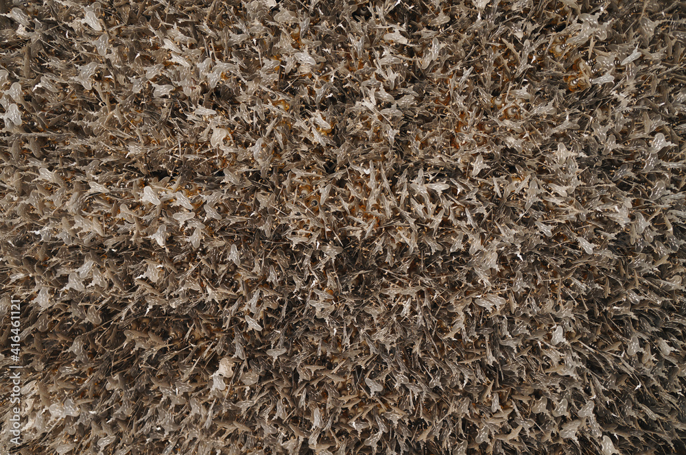 The natural pattern background pattern is an arrangement of gold metal objects. The natural pattern background pattern is an arrangement of gold metal objects.