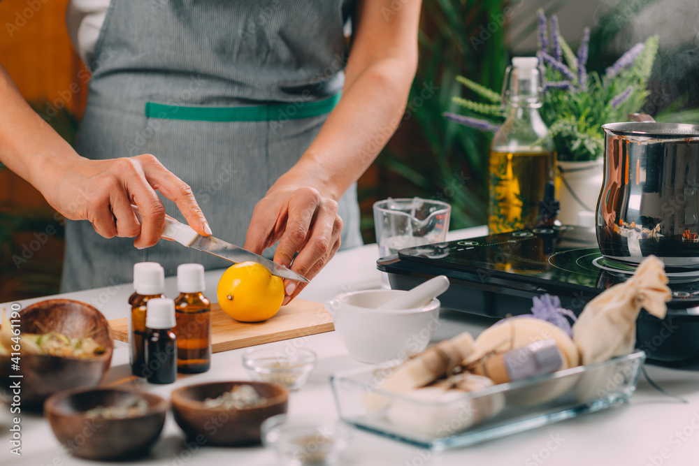 Woman Cutting Lemon for Homemade Soap Woman Cutting Lemon for Homemade Soap