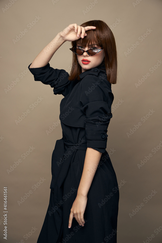 Fototapeta premium Brunette fashion clothes side view short hairstyle 