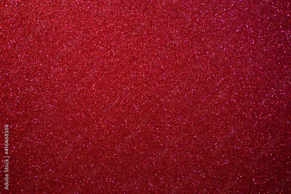 Glitter pink background.  Red and pink background with sparkling festive glitter