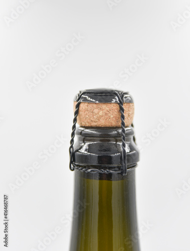 closer focus at the top part of the wine bottle