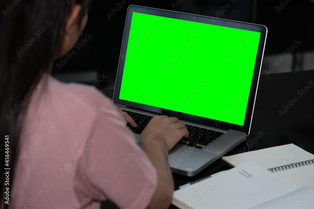 Closeup woman hand using computer laptop. Using online connect technology for business, education and communication. Green screen computer for graphic display montage. Closeup woman hand using computer laptop. Using online connect technology for business, education and communication. Green screen computer for graphic display montage.
