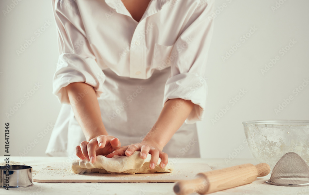 Woman chef preparing dough household healthy food