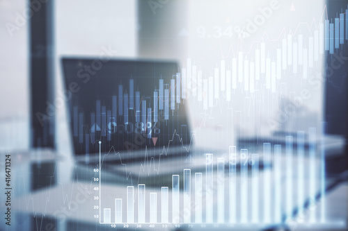 Abstract creative financial graph on modern laptop background, financial and trading concept. Multiexposure © Pixels Hunter