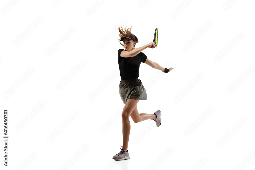 On fire. Young caucasian professional sportswoman playing tennis isolated on white background. Training, practicing in motion, action. Power and energy. Movement, ad, sport, healthy lifestyle concept. On fire. Young caucasian professional sportswoman playing tennis isolated on white background. Training, practicing in motion, action. Power and energy. Movement, ad, sport, healthy lifestyle concept.