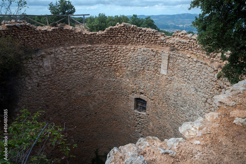 Old ice house in Font Roja Natural Park, province of Alicante, Spain photo