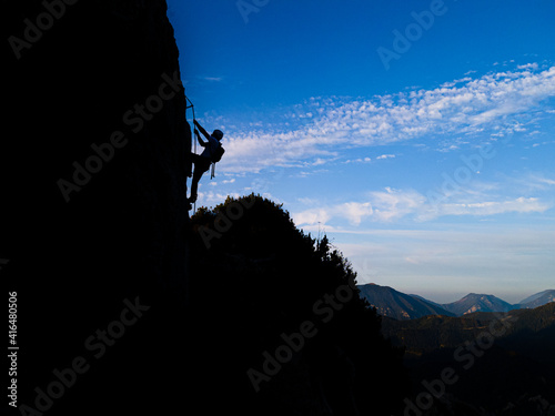 silhouette of a climber
